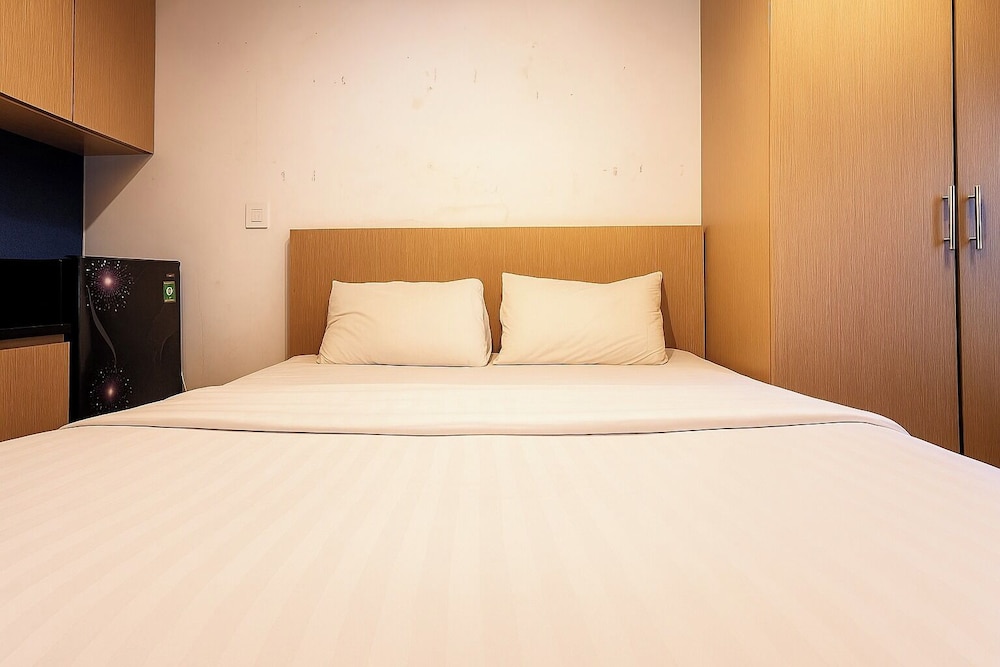 Quintessa Room at Candiland Apartement
