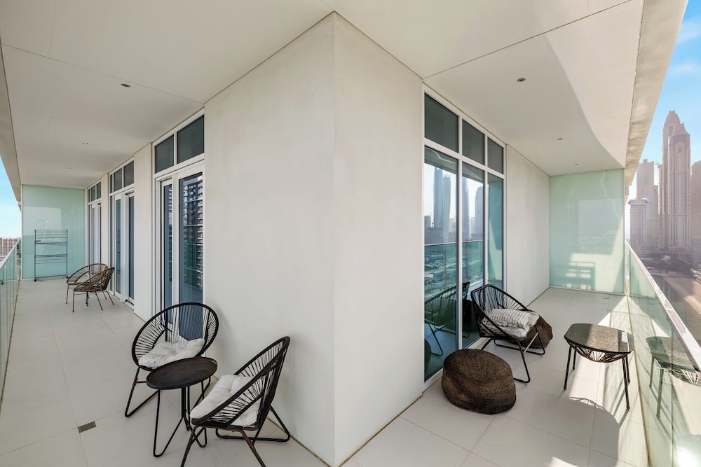 2BR Beachfront Retreat with Palm Views