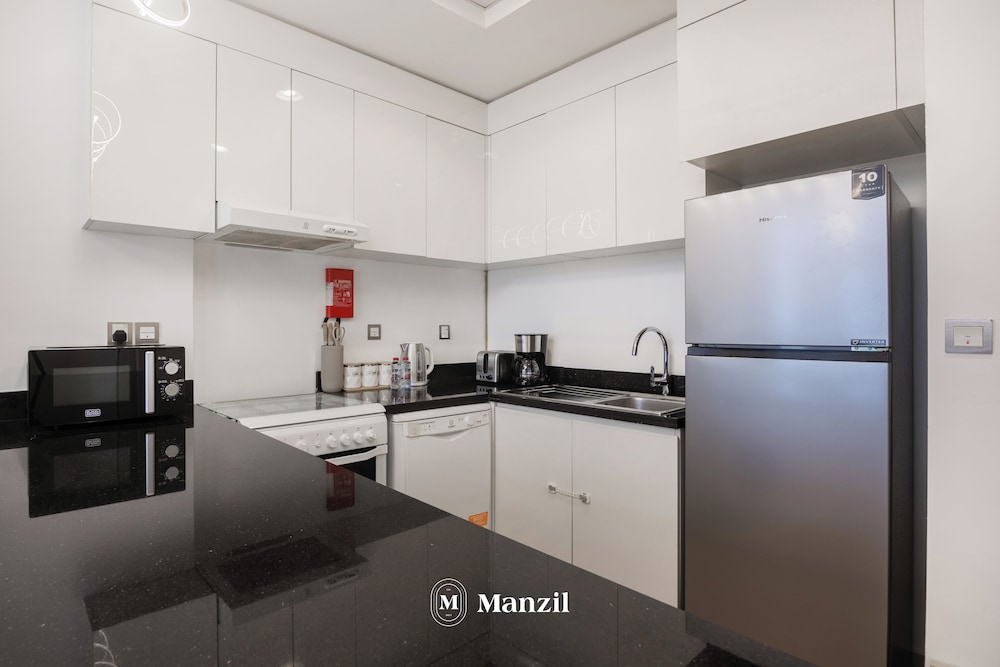 Manzil -1BR w Pool nr Dubai Sports City