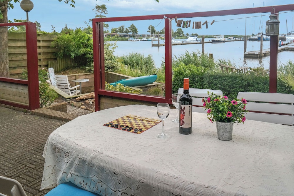 2 Pers - House König Lakeside of the Lauwersmeer With own Fishing Pier Sauna view 3