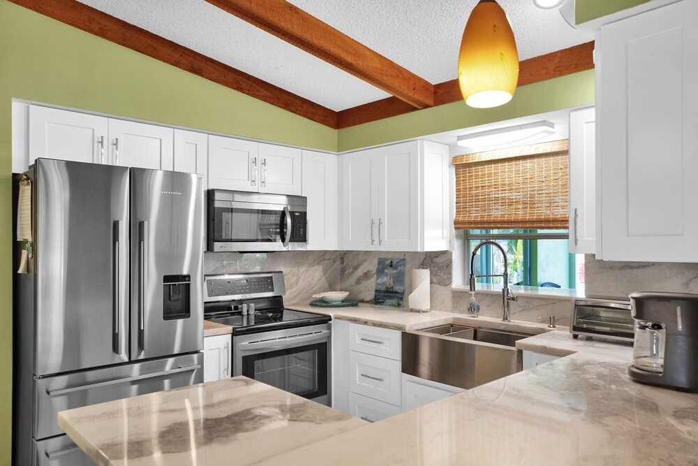 Delightful Vacation Home Located In The Popular Islamorada Neighborhood Of Port Antigua. 3 Bedroom Home by RedAwning