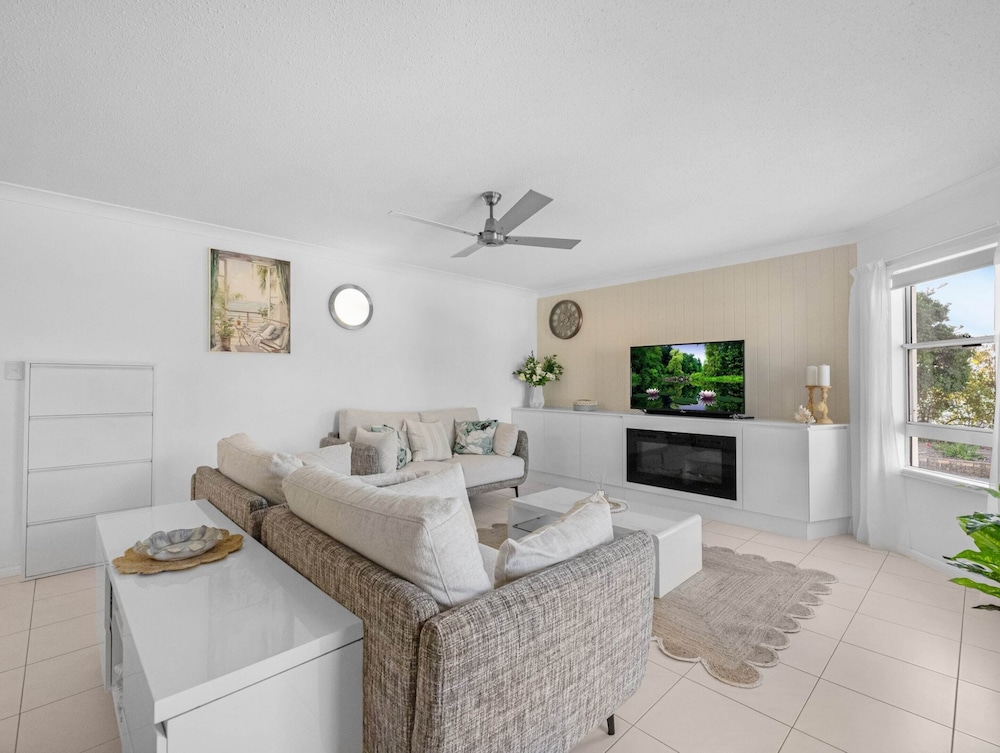 Bright Coastal Stay With Pool and Beach View