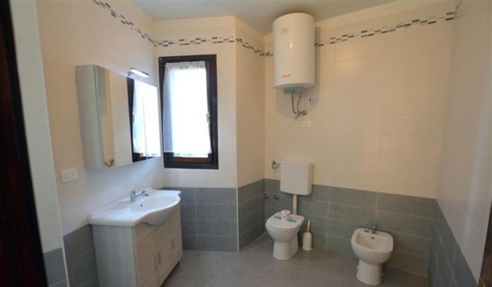 Wide row House With Private Fenced Garden for 9 Guests in Lignano Pineta