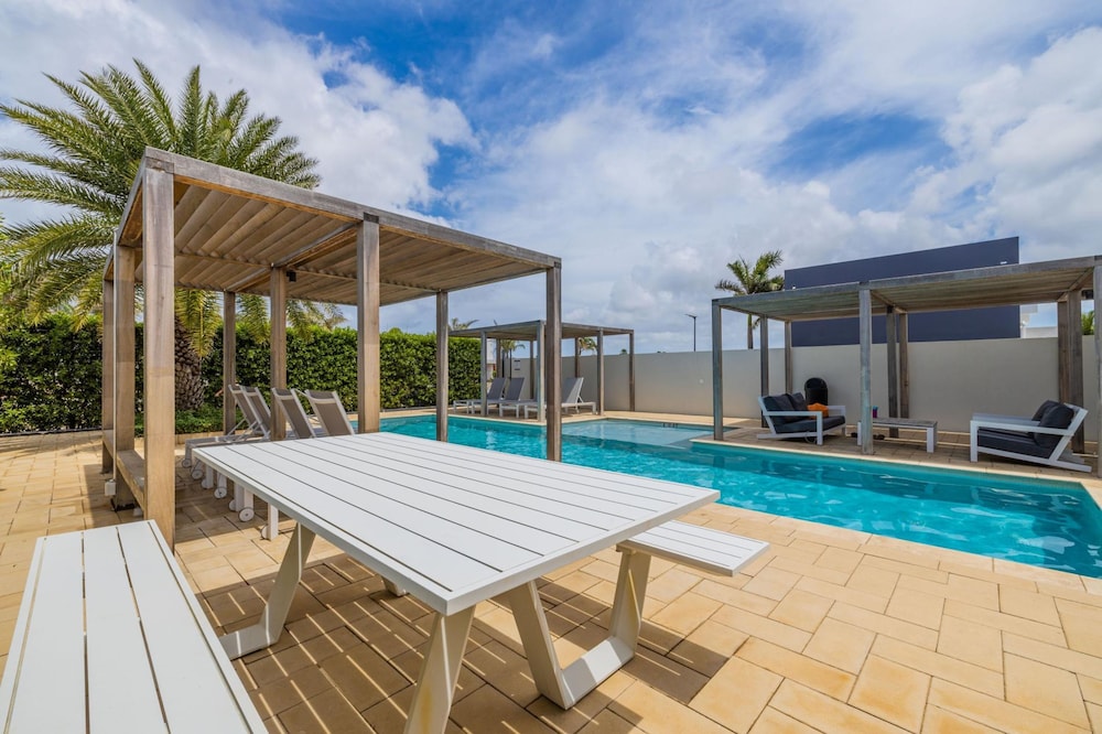 Serene Designer Gem Walk to Beach Strip Pool
