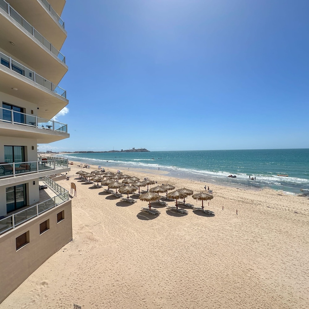 Brand-new Modern 2BR Gem on Iconic Sandy Beach
