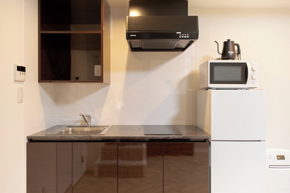 The under suite residence Ikebukuro by Tranova