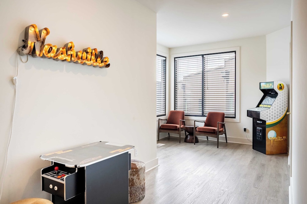 Sleeps 24 Rooftop, Game Room & Outdoor Spaces Just 10 Min to Broadway Outrider by Avantstay
