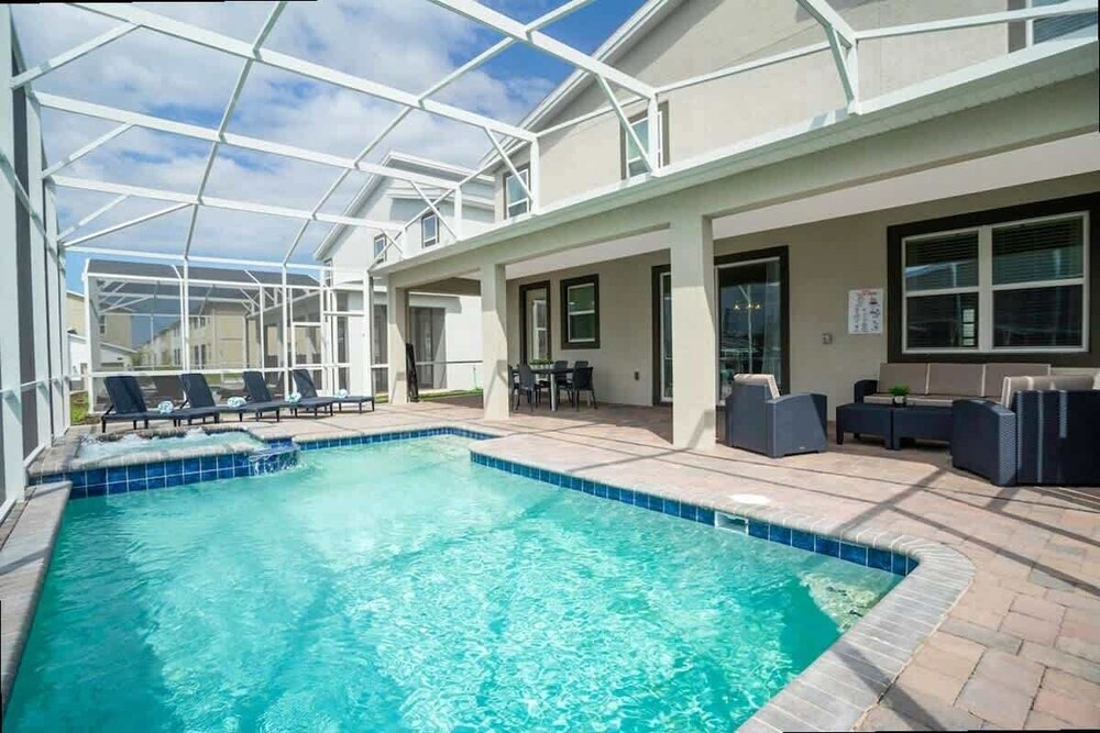 Spacious 7BR w Pool Spa Game Room Near Disney
