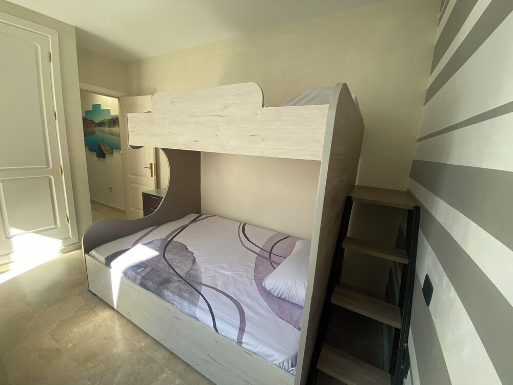 New Renovated Family Home Above Swimming Pool!