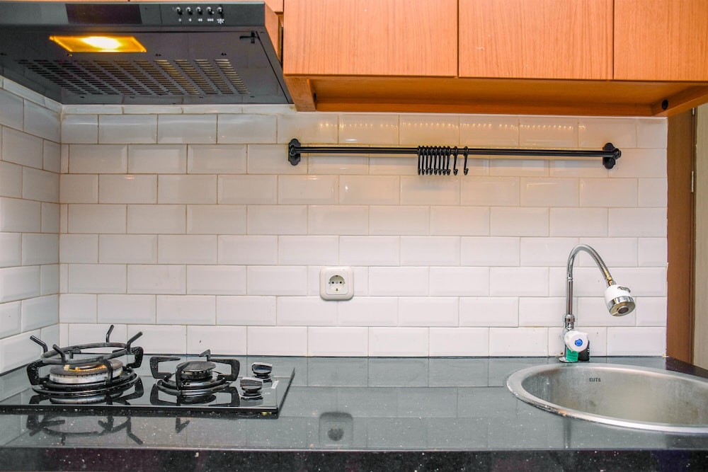 Nice and Warm 2BR at Podomoro Golf View Apartment