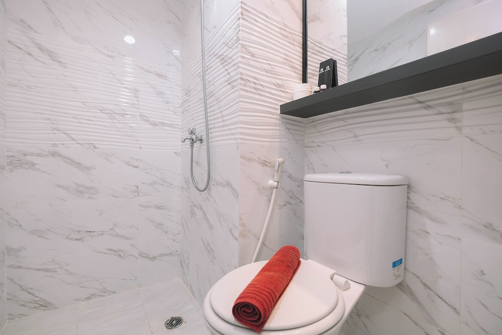 Simple and Cozy Living 2BR at Podomoro Golf View Apartment