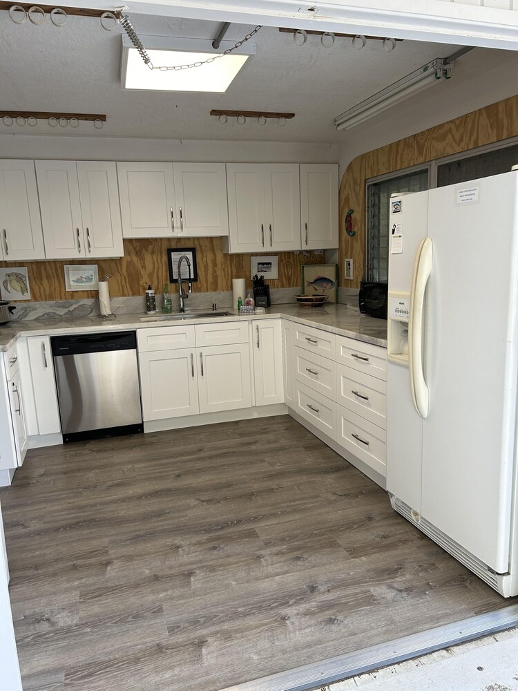 Delightful Vacation Home Located In The Popular Islamorada Neighborhood Of Port Antigua. 3 Bedroom Home by RedAwning