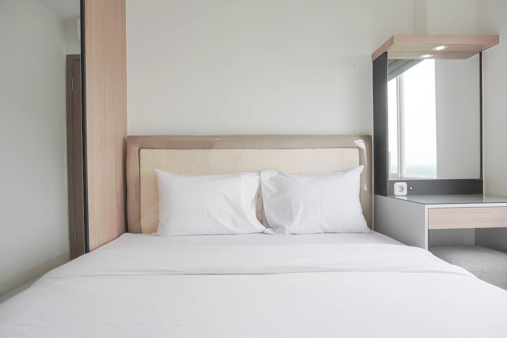 Homey and Minimalist 2BR at Podomoro Golf View Apartment