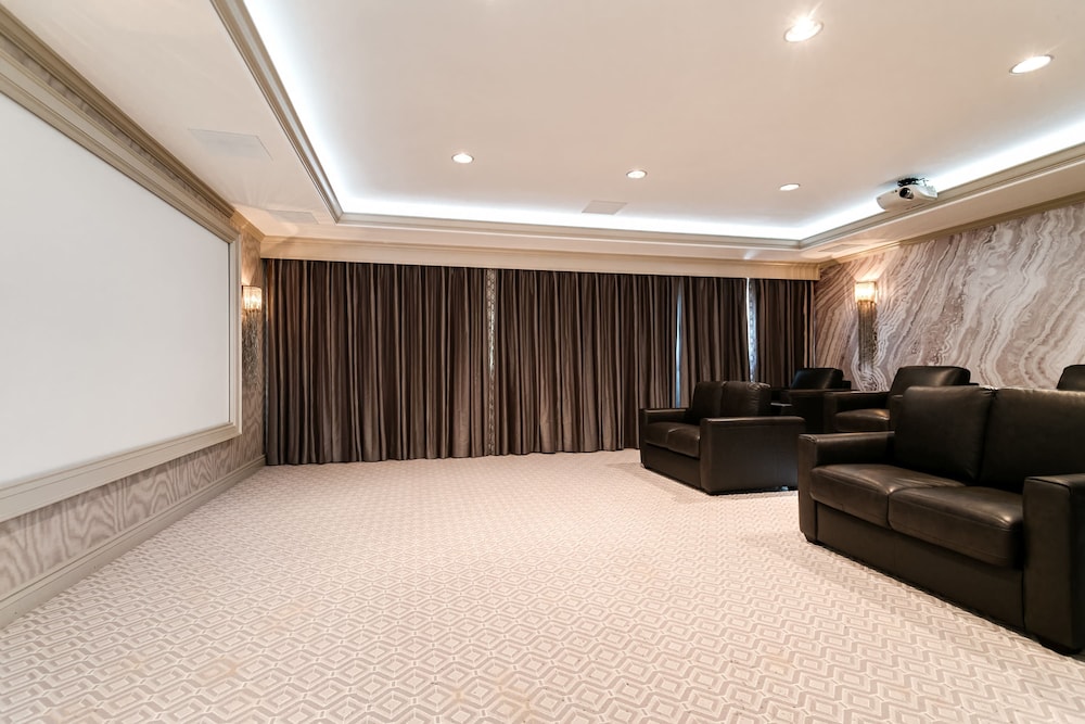 Waterfront Mansion With Game Room Gym Media Room and Guest House
