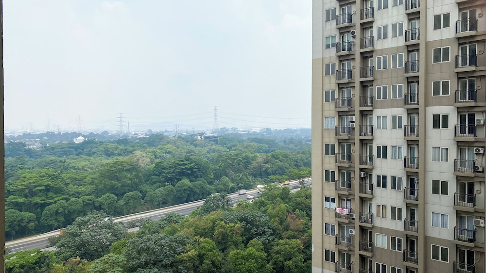 Minimalist and Restful 2BR at Podomoro Golf View Apartment
