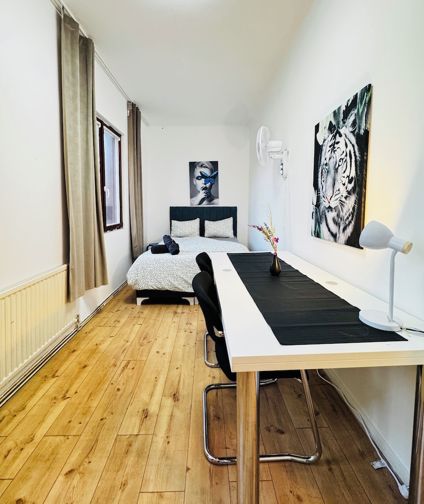 Central 8BR Stay with Garden and Terrace