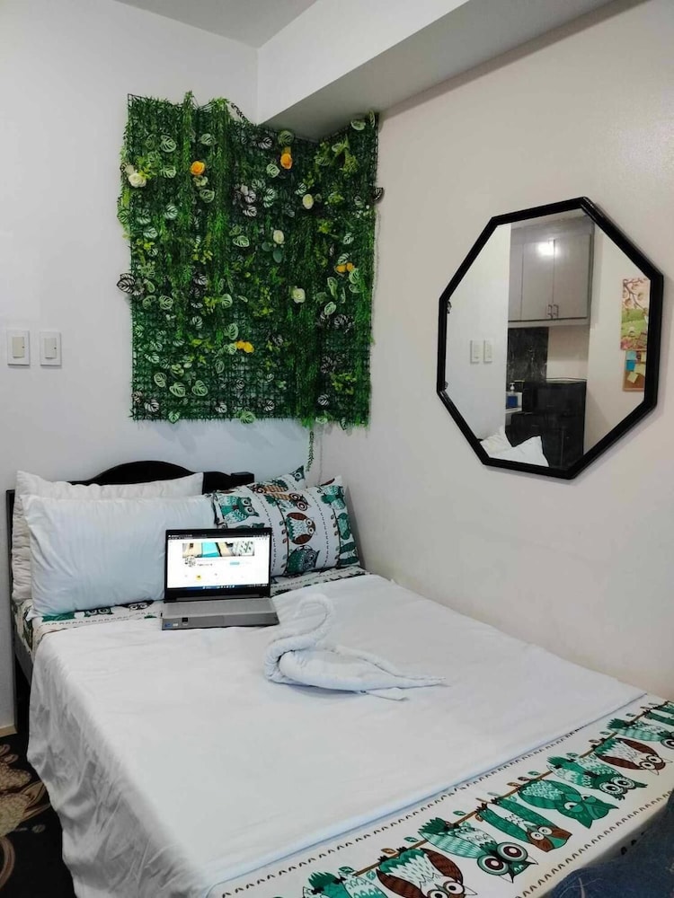 Cozy City View Condo in Quezon City - Your Home Away From Home