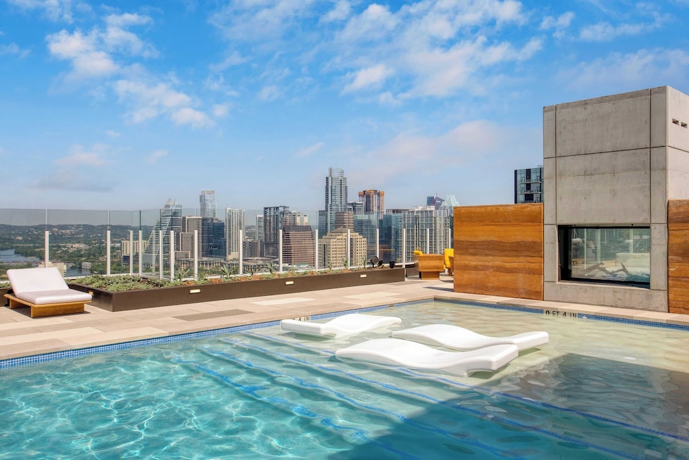 Luxe High Rise Near DT Austin w/ Views Rooftop Pool, Gym, & Luxe Amenities