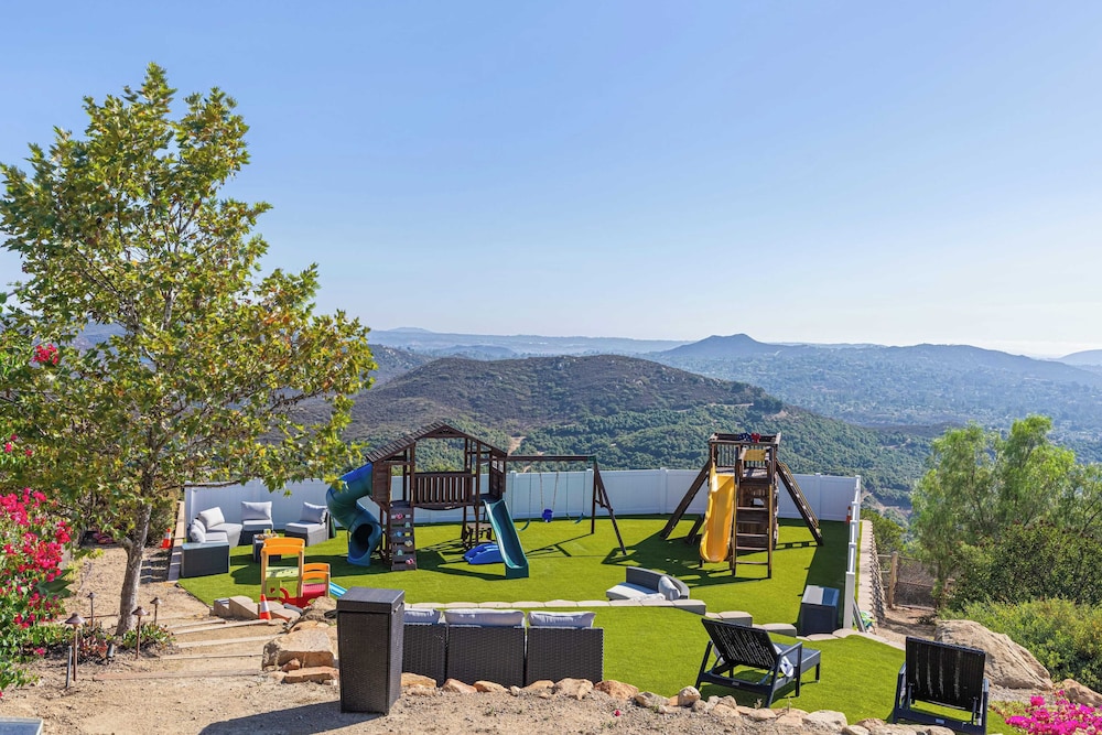 Infinity Pool, Theater, Pickleball + 360 Views Near Lake Poway Sunset Point Estate by Avantstay