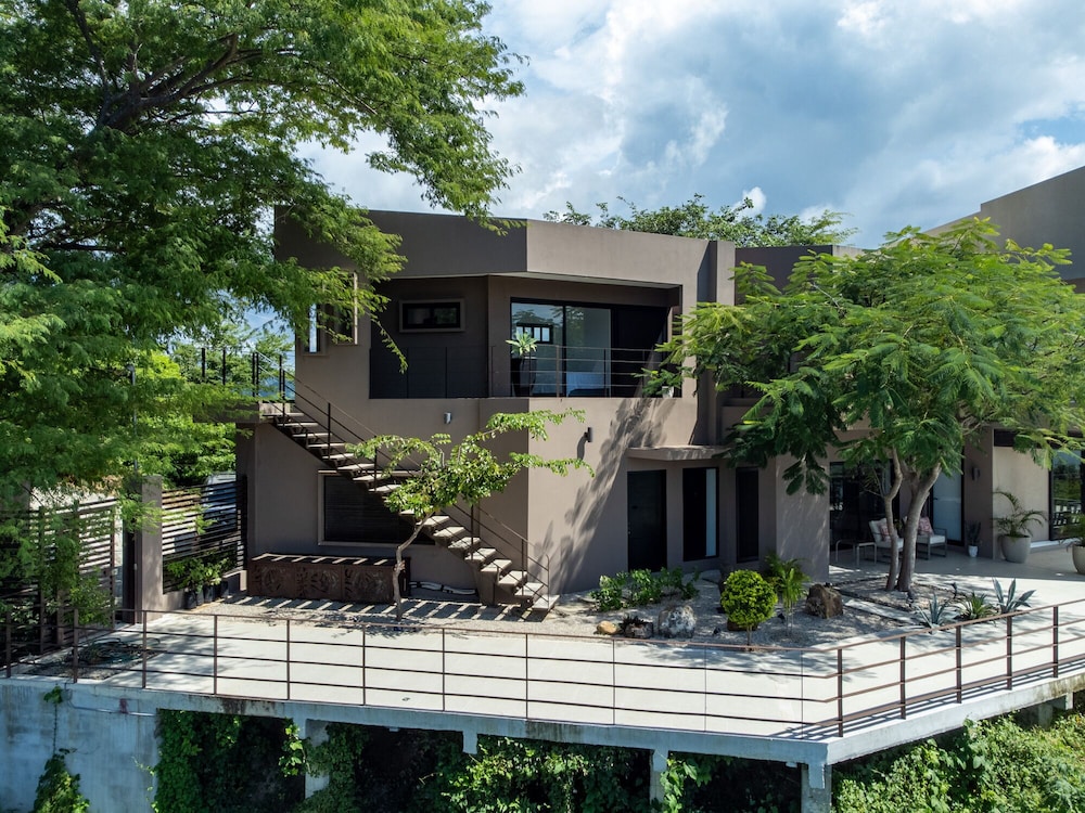 Luxury 5BR Oceanview Villa with Infinity Pool, King Beds, and Sunset Views Over Playa Prieta