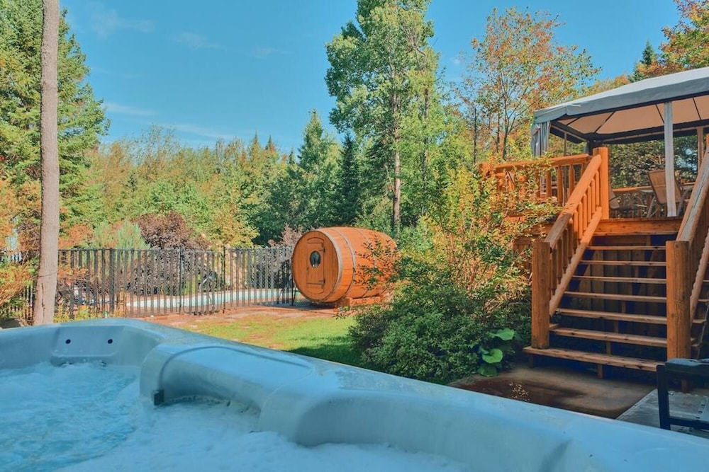 Grand Duc 74 - Gorgeous log Cottage With Private hot tub Heated Pool and Sauna