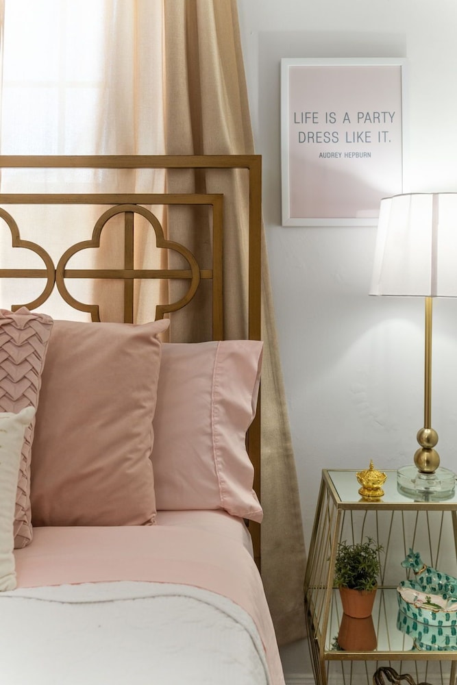 The Pink & Old Clarksville House