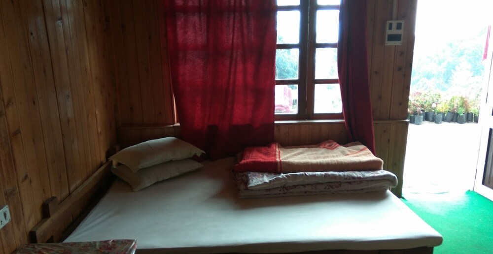 Goroomgo Pink Floyed Homestay Kalimpong