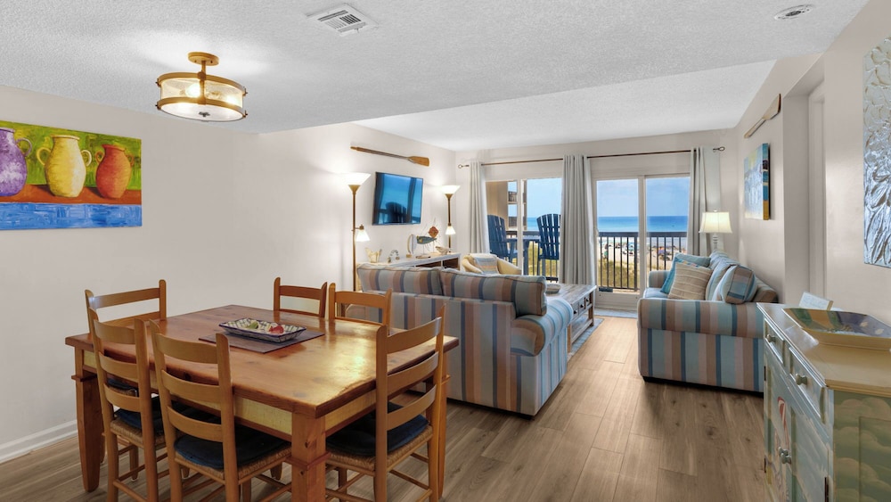 Beachfront Charm Meets Lake Life + Free Tickets: Dolphin Cruise & More!