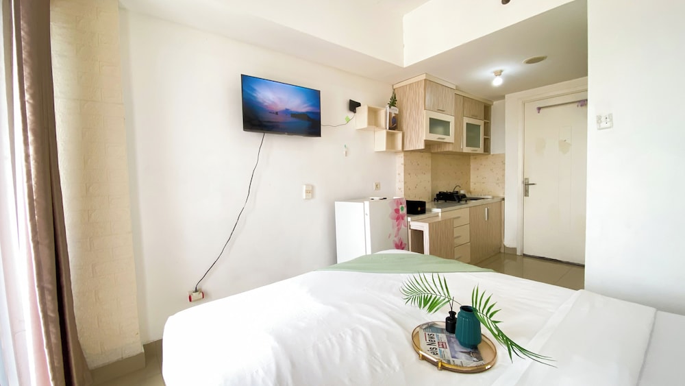 Homey And Cozy Living Studio At Poris 88 Apartment