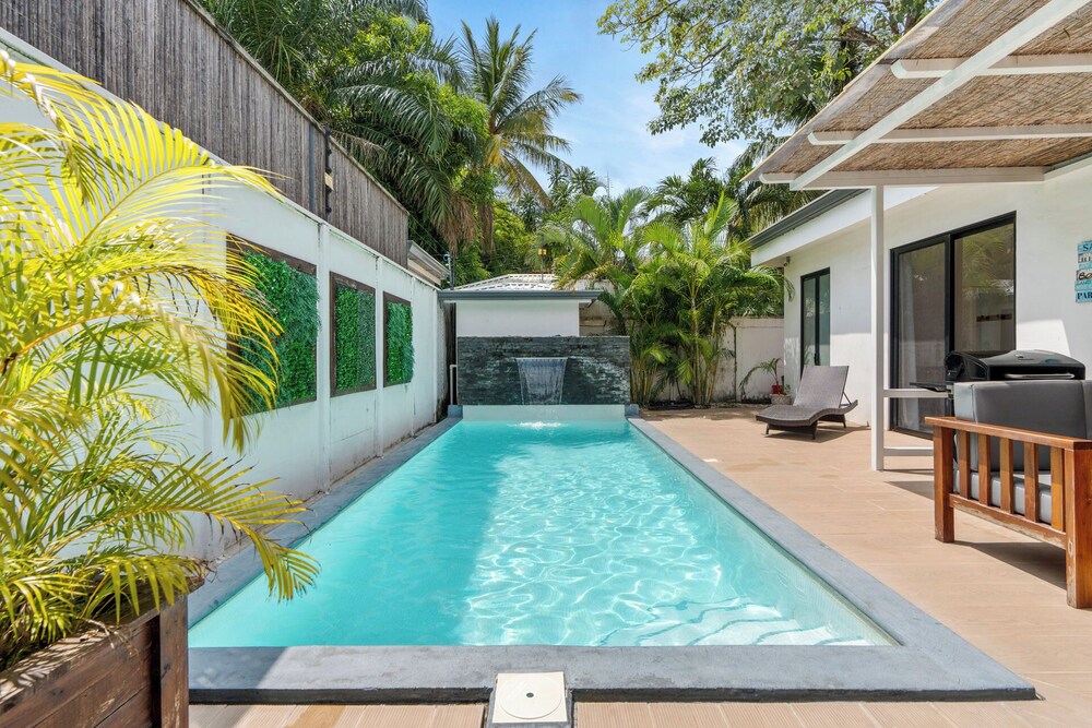 Stylish Modern Home with a Tranquil Outdoor Oasis, Spacious Open Floor Plan, and Private Swimming Pool