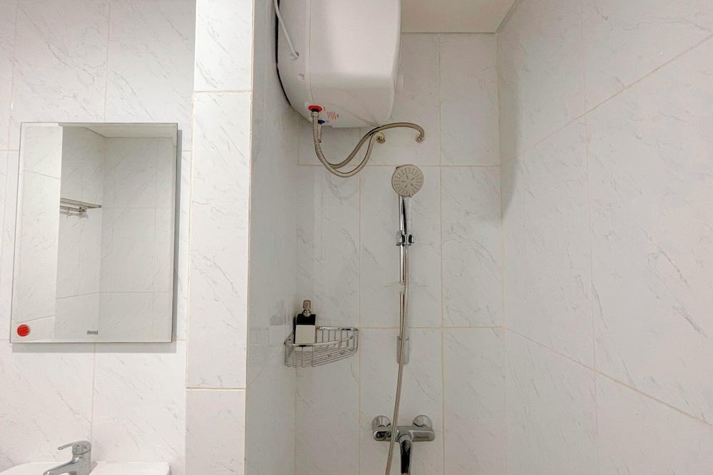 Grey Toned 1Br Apartment Tamansari Skylounge Makassar