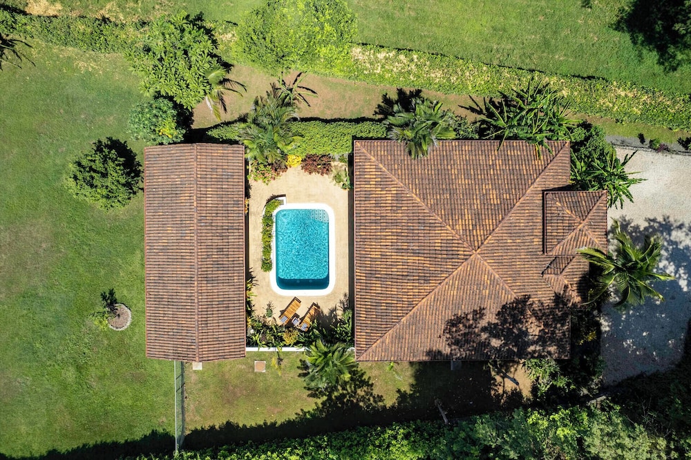 Stylish Home with Chic Decor, Luxury Amenities & Tropical Outdoor Oasis with Sparkling Private Pool