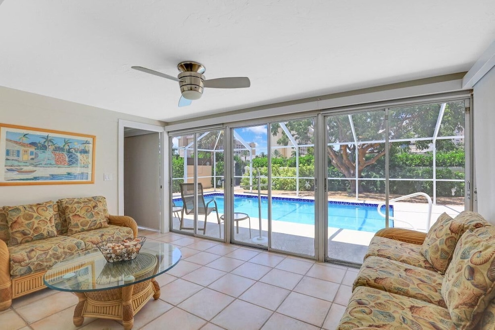 Cozy Home With Sunroom, Pool and Steps to Beach view 5
