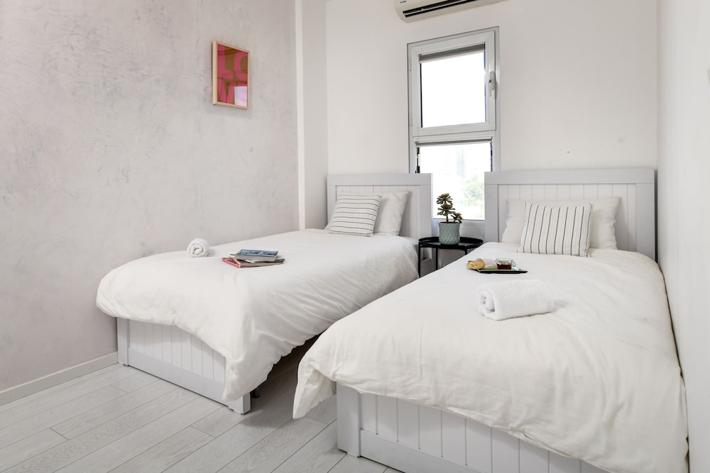 Modern Gem with Stunning Balcony by Sea N Rent