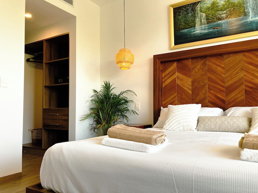 Stylish Playacar Condos w Balcony & Pool