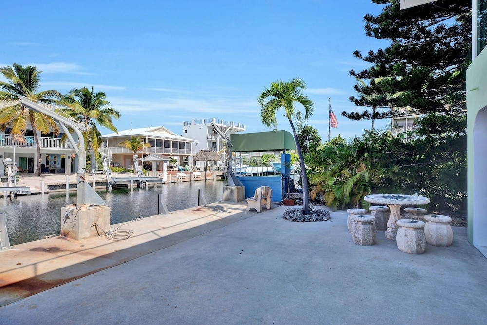 Delightful Vacation Home Located In The Popular Islamorada Neighborhood Of Port Antigua. 3 Bedroom Home by RedAwning