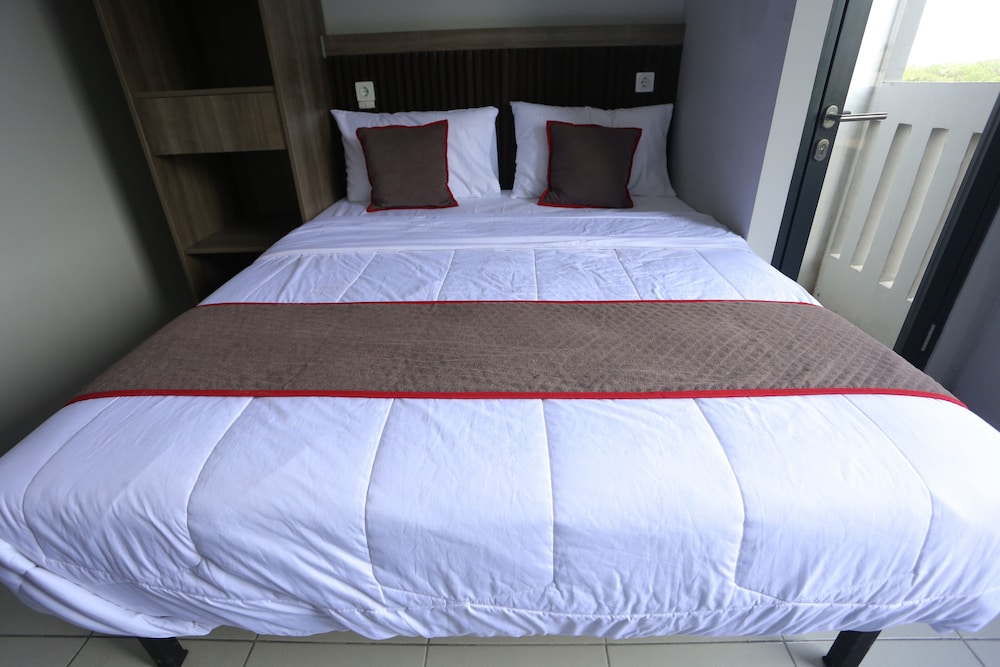 Capital O 95049 Aurora Rooms Riverdale