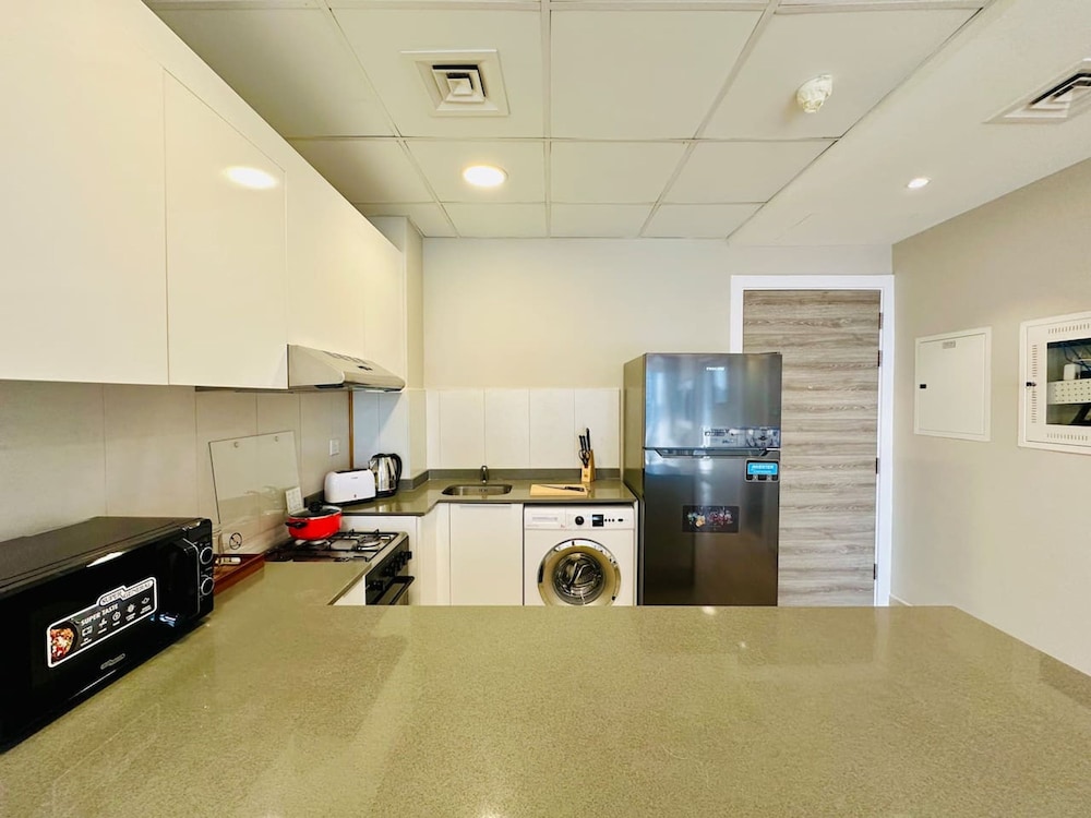 Stylish 1BR in JVC w Pool 6 Mins to Circle Mall
