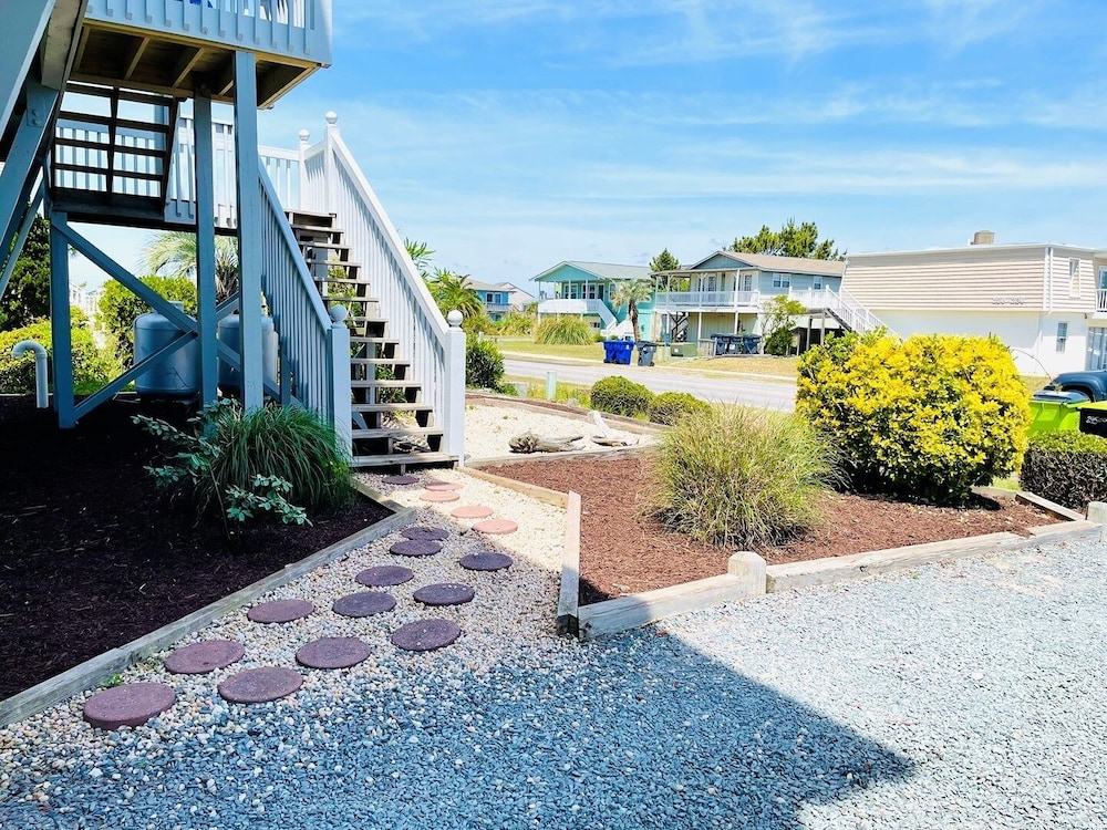 Sunny Times 4 Bedroom Home by RedAwning