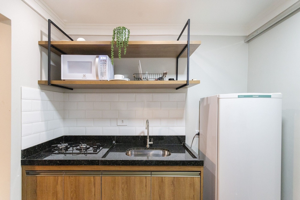 Casa Jardim. Ar e garagem