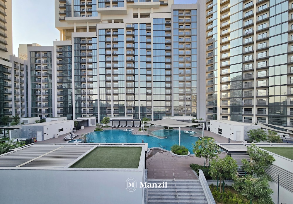 Manzil - Stylish 1BR with Pool and Gym