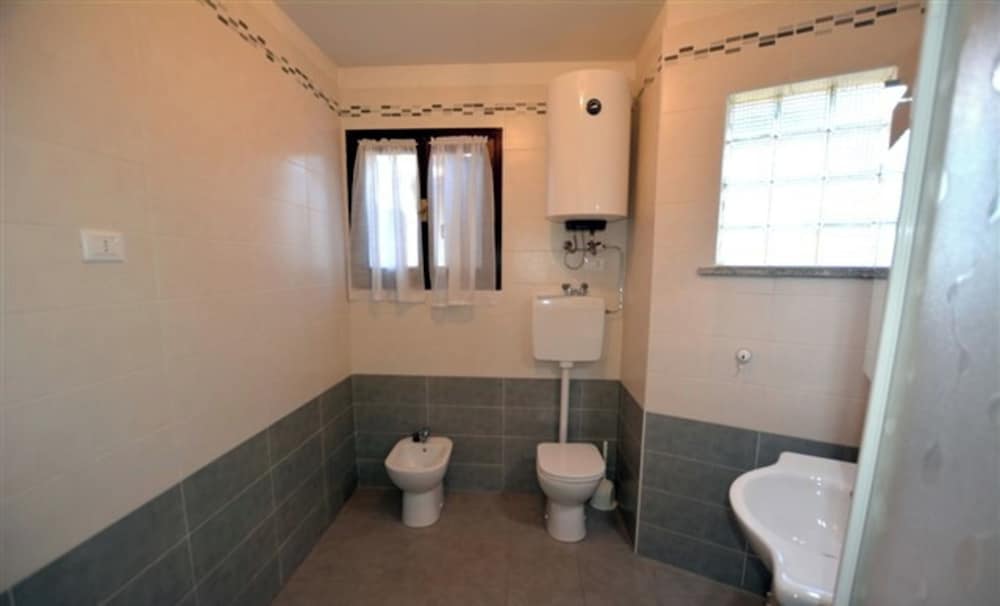 Large row House With Private Fenced Garden for 10 Guests in Lignano Pineta