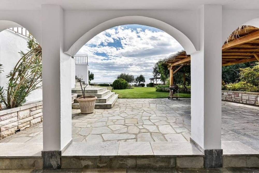 Azure Coast Seafront Retreat by Rentalspro