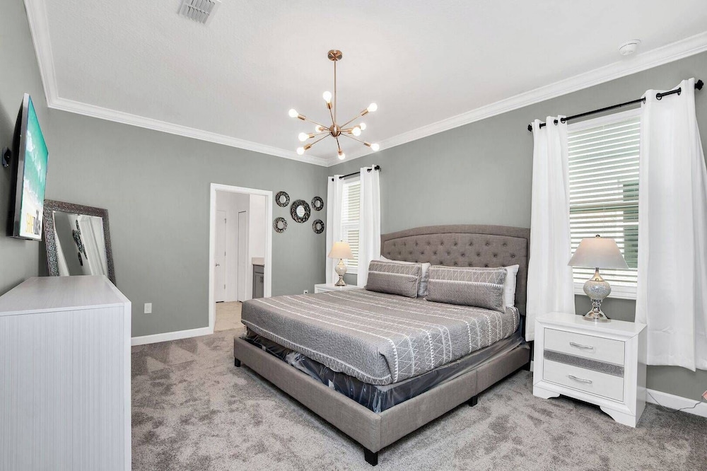 Serenity Lakeview Retreat Stunning Water Views, No Rear Neighbors, Private Pool, Game Room & Star Wars Cinema