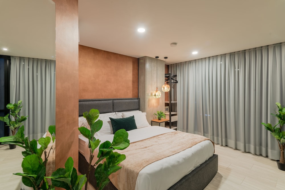 VPV Suites en Medellín — hotel room