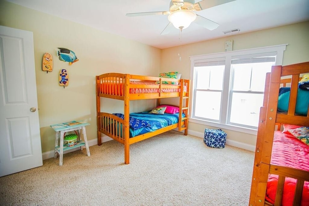Life's A Beach 4 Bedroom Home by RedAwning