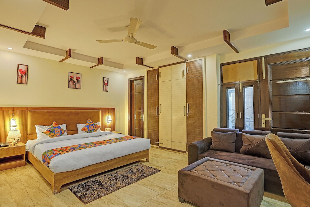 Fabhotel Orchid White Inn