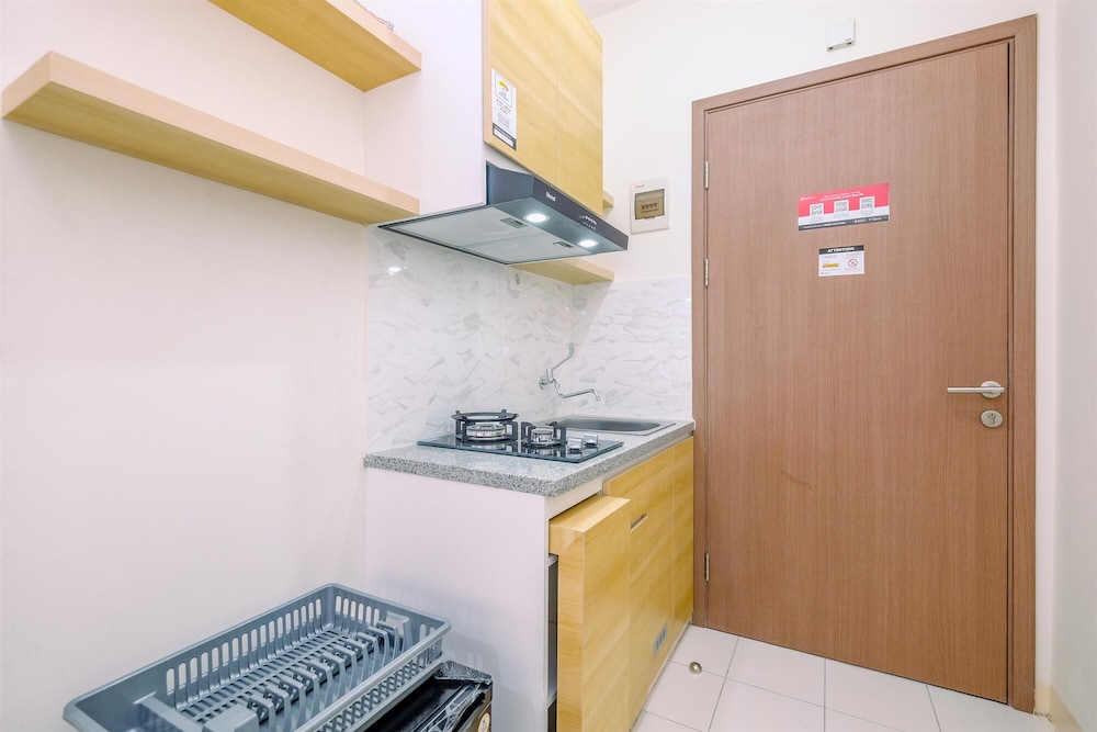 Nice and Warm Studio at Podomoro Golf View Apartment