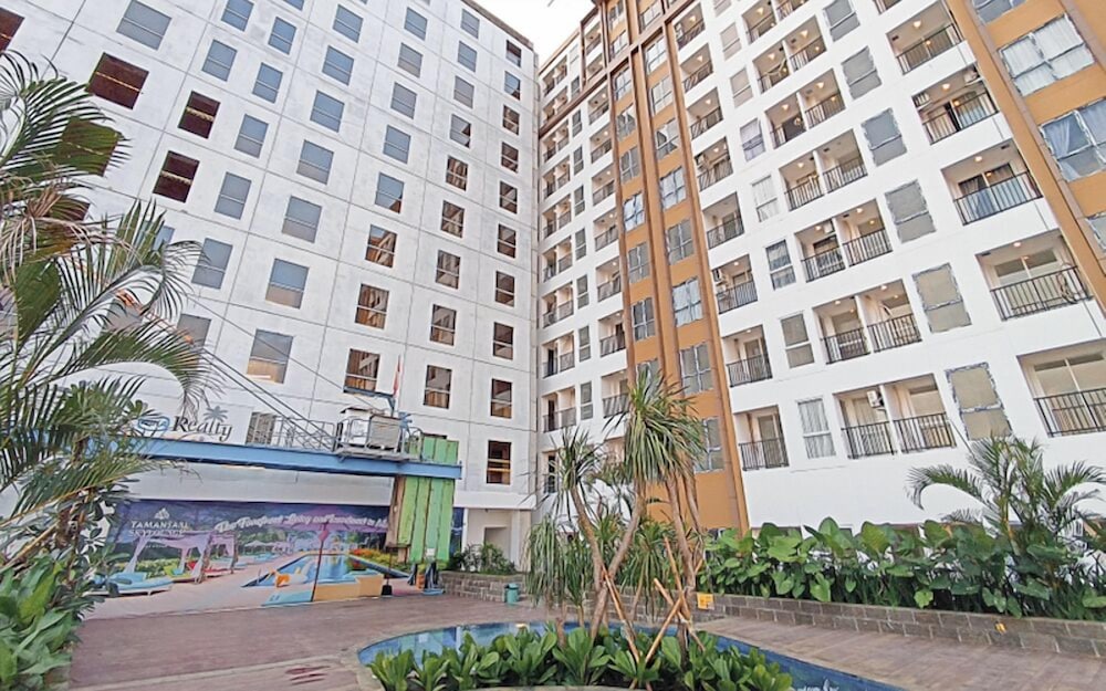 Grey Toned 1Br Apartment Tamansari Skylounge Makassar