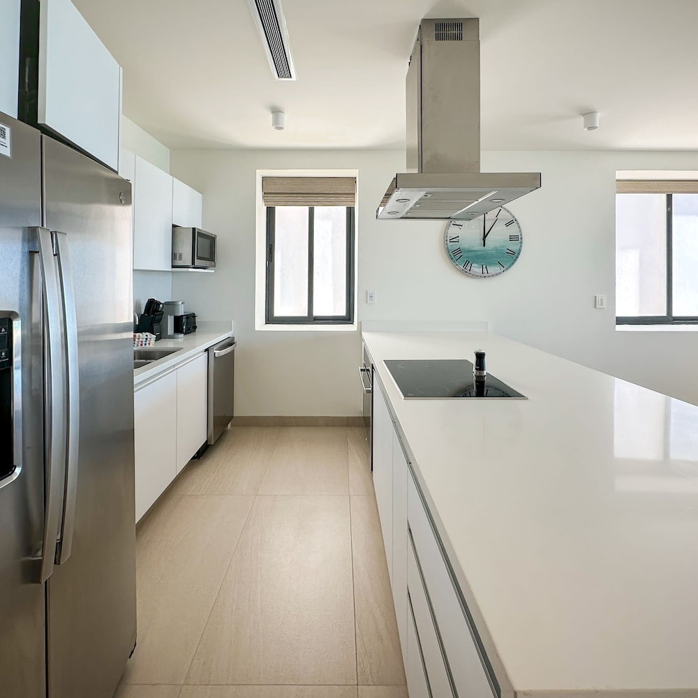 Brand-new Modern 2BR Gem on Iconic Sandy Beach